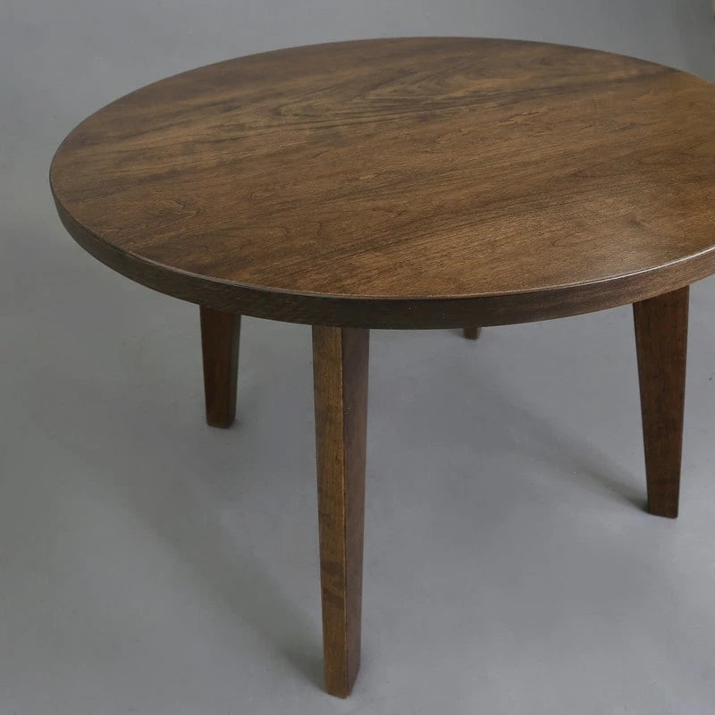 Table ronde en bois massif avec finition grain de bois naturel