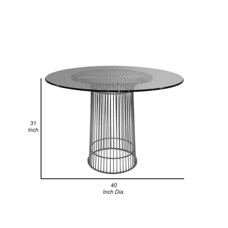 Table à manger ronde avec plateau en verre trempé et piètement central en fils de chrome